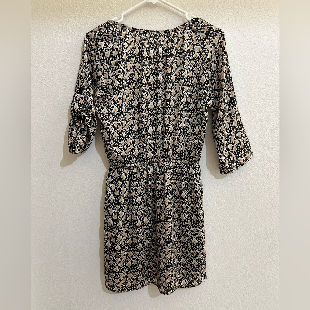 Silky dress, perfect for work. Wear with suit jackets.